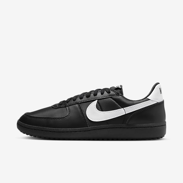 White nike shoes with black nike sign on sale